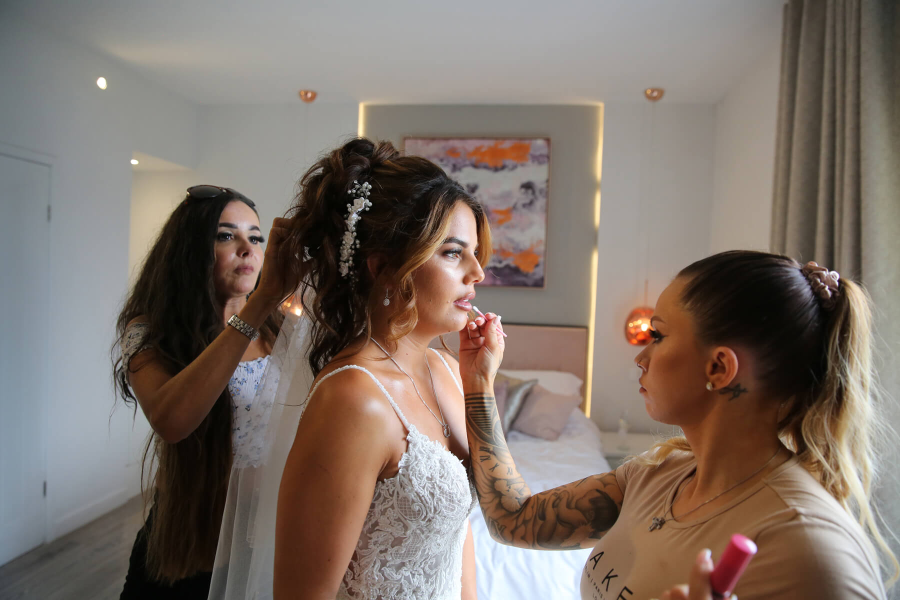 bride having her makeup done