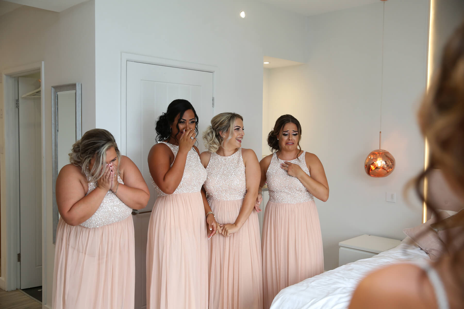 four bridesmaids emotional
