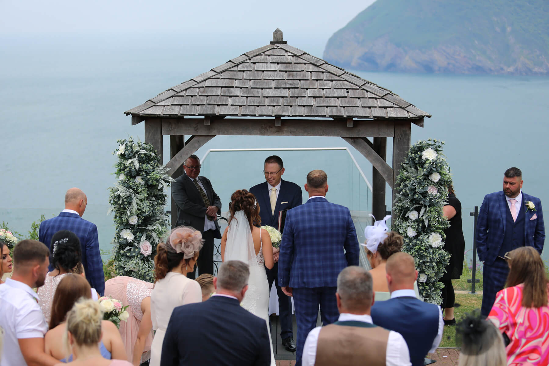 bride and groom holding hands at their ceremony