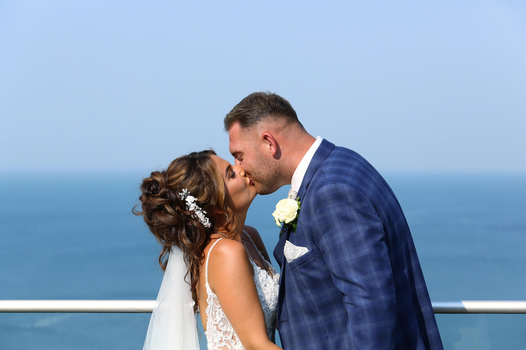 bride and groom kissing