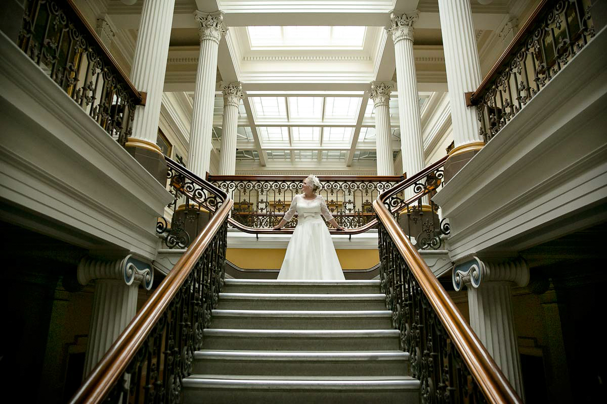 bride on the top of the stairs