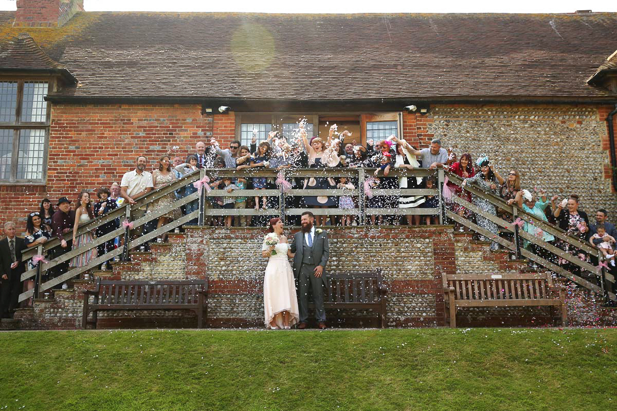 Eastbourne_wedding_photographer_Manor_Barn_Bexhill_powell-ful_photography confetti shot