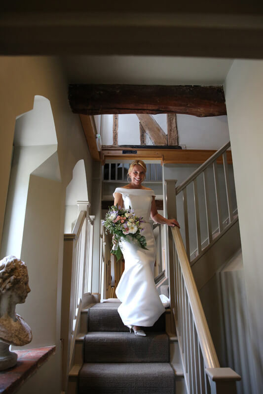 bride walking down the stairs