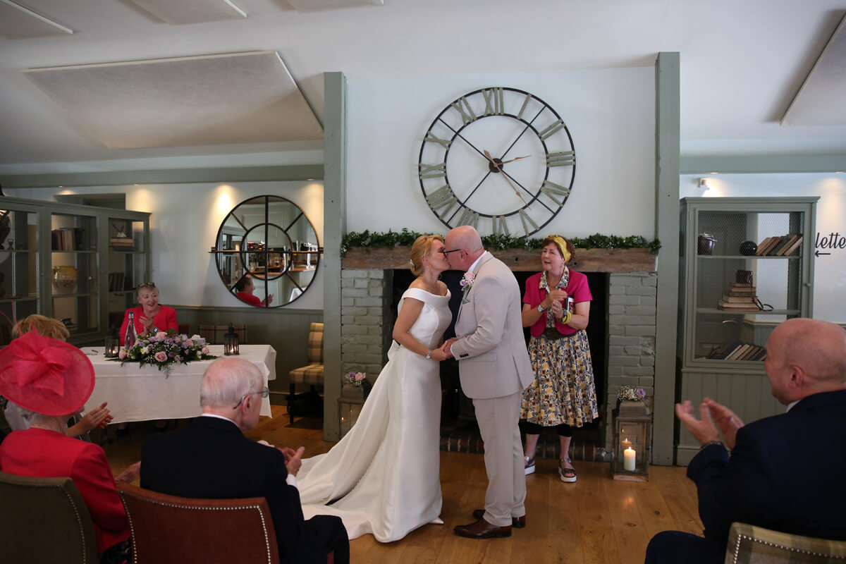 bride and groom kissing