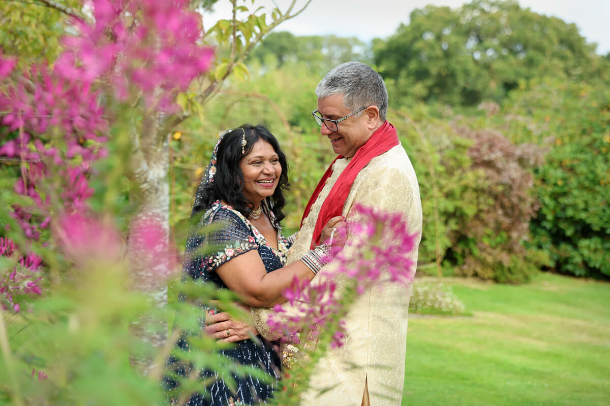 Indian wedding, bride and groom laughing