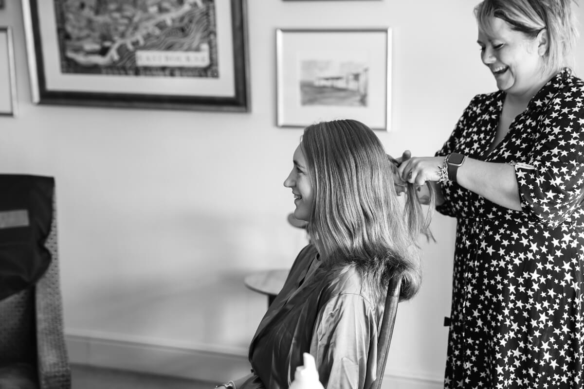 lady getting her hair finished